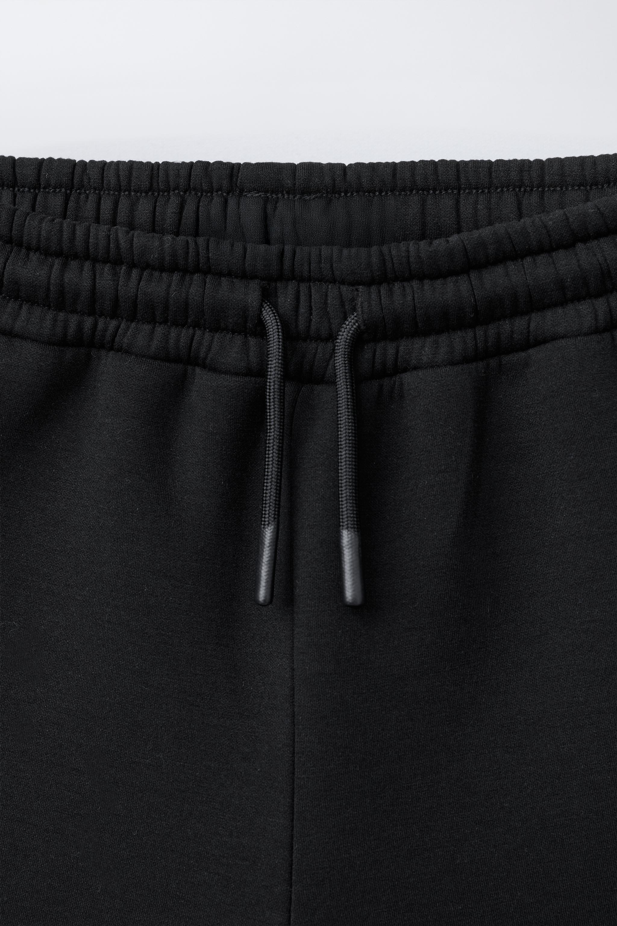 NEOPRENE EFFECT STRAIGHT FIT PANTS